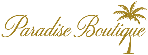 Logo of Paradise Boutique with a palm tree on a white background
